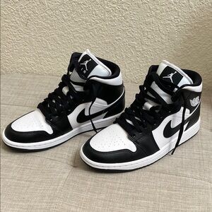 Air Jordan 1 Mid Women’s Black and White Sneakers